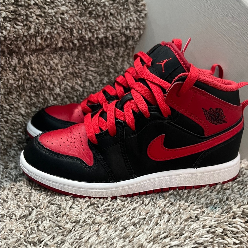 Red and Black Jordan ones